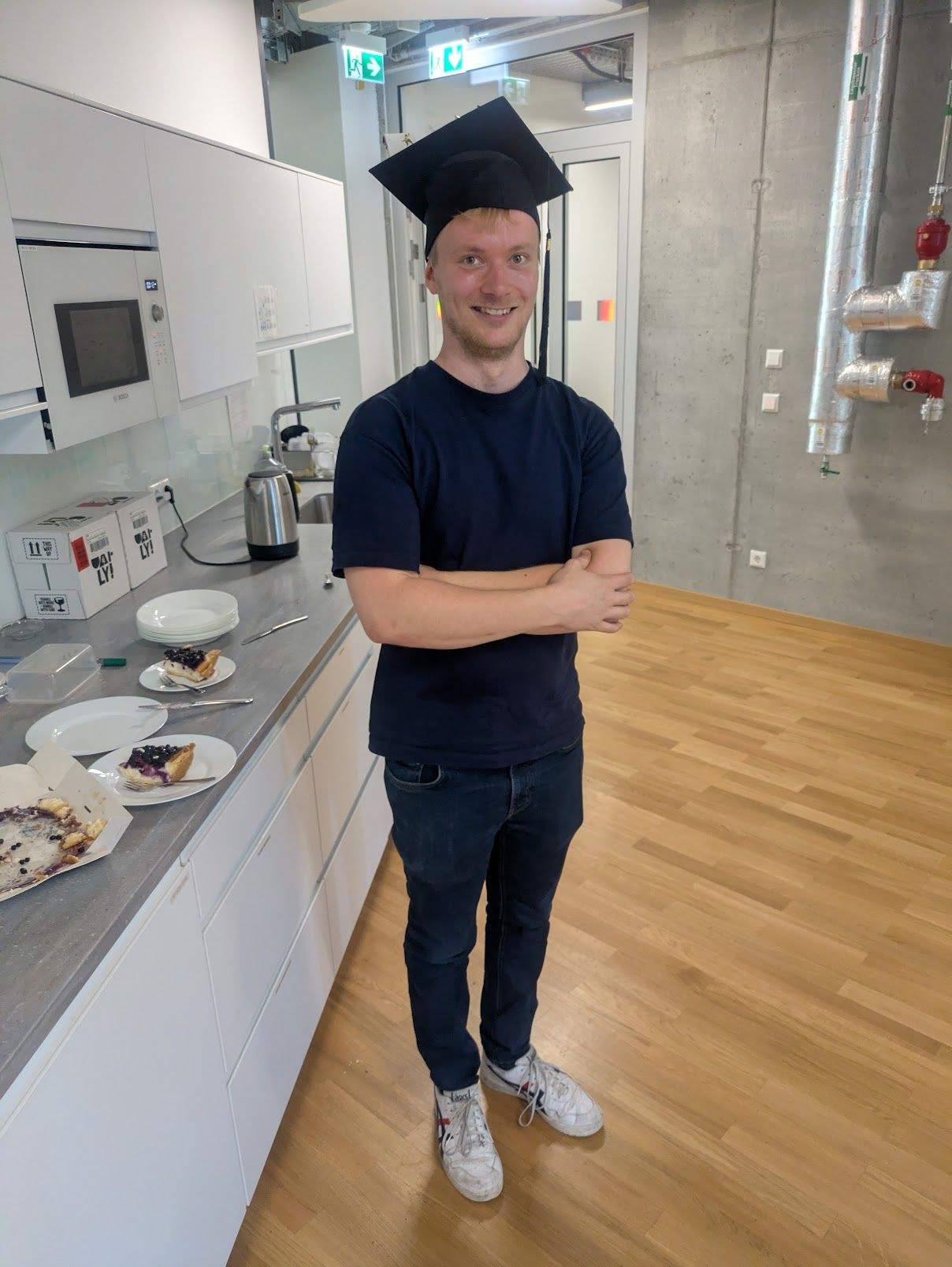 Nikolas Morshuis wearing the doctoral hat